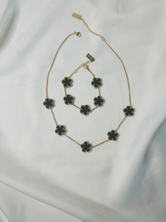 Conjunto collier y pulsera flor negra
